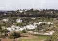 White prehistoric trulli roundhouses in Itria Valley, south-east Murgia.