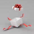 White present box open or white gift box with red ribbons and bow on dark gray background with shadow minimal concept Royalty Free Stock Photo