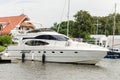 White private yacht in port, Pavilosta, Latvia. Traveling, summer vacation