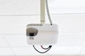 White projector hanging on the ceiling Royalty Free Stock Photo