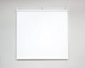White projector screen for showing information or cinema in office room Royalty Free Stock Photo