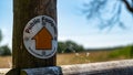 Public footpath directional sign on a wooden post Royalty Free Stock Photo