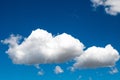 White puffy clouds on blue sky