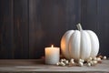 White Pumpkin And Candle Decor On Painted Wood Table, Creating Festive Halloween And Thanksgiving Ambiance