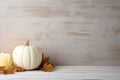 White Pumpkin And Candle Decor On Painted Wood Table, Creating Festive Halloween And Thanksgiving Ambiance