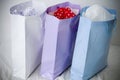 White, purple and blue paper gift shopping bags Royalty Free Stock Photo