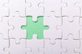White puzzle background with one piece missing. Close-up. Concept success of business Royalty Free Stock Photo