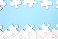 White puzzle frame on pastel blue background Royalty Free Stock Photo