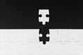 White puzzle with missing piece on black background. Business concept. Finish what you start. Team work and partnership. Royalty Free Stock Photo