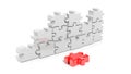 White puzzle pieces forming wall with one red piece down Royalty Free Stock Photo