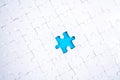 White Puzzle pieces with one piece removed, blue color Royalty Free Stock Photo