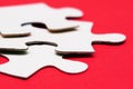 White puzzle on red Royalty Free Stock Photo