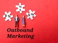 white puzzle with the word Outbound Marketing. Royalty Free Stock Photo