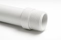 White PVC pipe short section with male threaded end partly wrapped with white PTFE tape on white Royalty Free Stock Photo