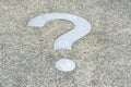 White Question mark on concrete concept - decisions, uncertainty, choice in life or business. Copy space Royalty Free Stock Photo