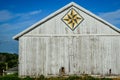 White Quilt Barn with Geometric Star Pattern