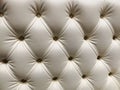 White quilted leather background with buttons. Copy space Royalty Free Stock Photo