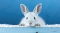 A white rabbit sitting on top of a wooden table. Generative AI image. Royalty Free Stock Photo