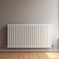 white radiator at a gray wall, heating of a room