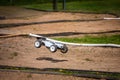 White Radio Controlled RC Offroad Truggy on an outdoor track training during sunny day Royalty Free Stock Photo