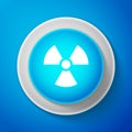 White Radioactive icon isolated on blue background. Radioactive toxic symbol. Radiation Hazard sign. Circle blue button Royalty Free Stock Photo