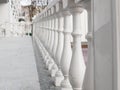White railing. Beautiful vintage white concrete balcony railing