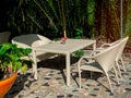 White rattan dining table furniture set Royalty Free Stock Photo