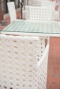 White rattan sofa and table sets in outdoor vertical