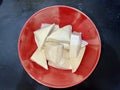 White raw tofu on red bowl or plate Royalty Free Stock Photo