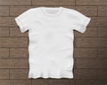 White realistic male t-shirt with short sleeves. Blank t-shirt template on Vintage wooden floor isolated. Cotton man