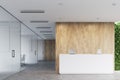 White reception, wooden office, front Royalty Free Stock Photo