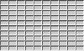 White rectangle wall patterns with low edges. Royalty Free Stock Photo