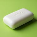 White rectangular bar of soap with rounded edges, embossed with the word \