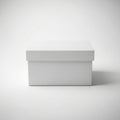 A white rectangular box with a lid on a plain white background casting a subtle shadow Royalty Free Stock Photo