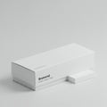 White rectangular box on a light gray surface features a minimalist design with black Royalty Free Stock Photo