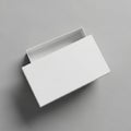 White rectangular box with an open lid set against a light gray background Royalty Free Stock Photo
