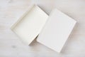 White rectangular empty open box, top view on wooden background Royalty Free Stock Photo