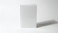A white rectangular object casting a shadow on a plain background Royalty Free Stock Photo