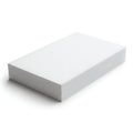 A white rectangular object with a perforated side on a plain background Royalty Free Stock Photo