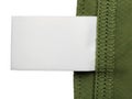 A white rectangular object placed on top of a green textured surface Royalty Free Stock Photo