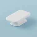 White rectangular object with rounded corners, resembling a wireless charging pad or Royalty Free Stock Photo