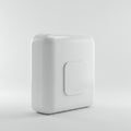 A white, rectangular object with rounded edges, featuring a slightly raised square Royalty Free Stock Photo