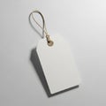 White rectangular paper tag with angled top corners, featuring a brown circular Royalty Free Stock Photo