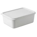 A white rectangular plastic container with a lid for food storage and organization Royalty Free Stock Photo