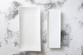 White rectangular Plate on abstract white wooden background Royalty Free Stock Photo