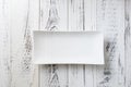 White rectangular Plate on white wooden background Royalty Free Stock Photo