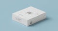 A white, rectangular product box with a geometric pattern set against a light blue Royalty Free Stock Photo