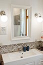 White rectangular sink detail with chrome tap