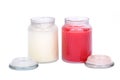 White and red candles in house warmer house jar Royalty Free Stock Photo