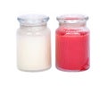 White and red candles in house warmer house jar Royalty Free Stock Photo